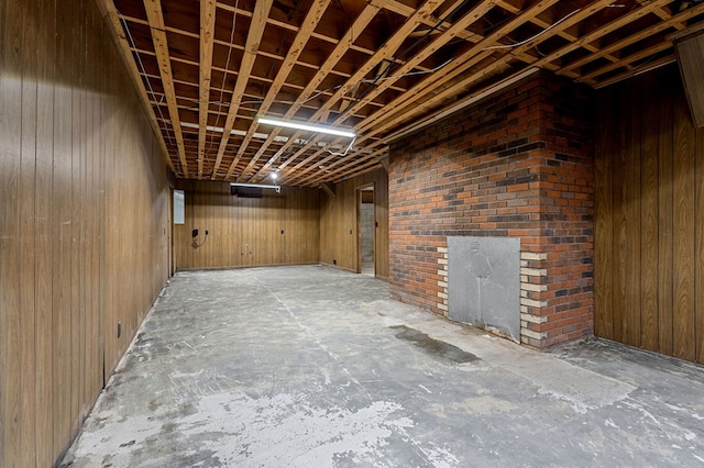 interior space featuring wood walls