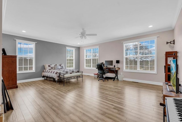 bedroom featuring ornamental molding, light wood-type flooring, recessed lighting, and baseboards