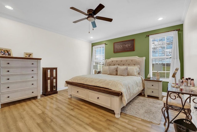 bedroom with light wood finished floors, baseboards, crown molding, and recessed lighting