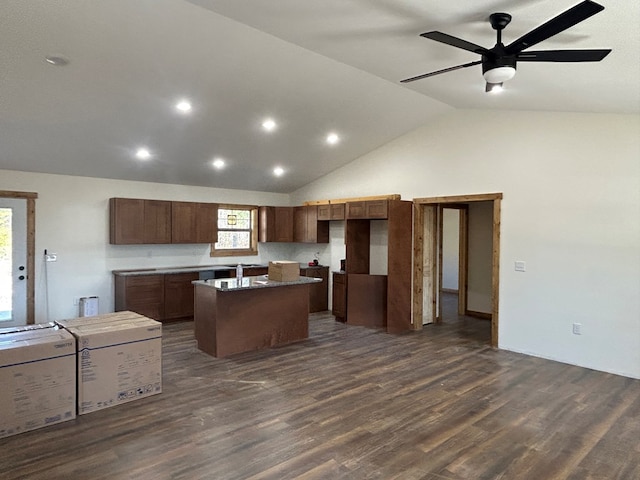 kitchen with high vaulted ceiling, a center island, dark wood finished floors, and ceiling fan