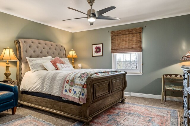 bedroom featuring carpet, baseboards, a ceiling fan, and ornamental molding