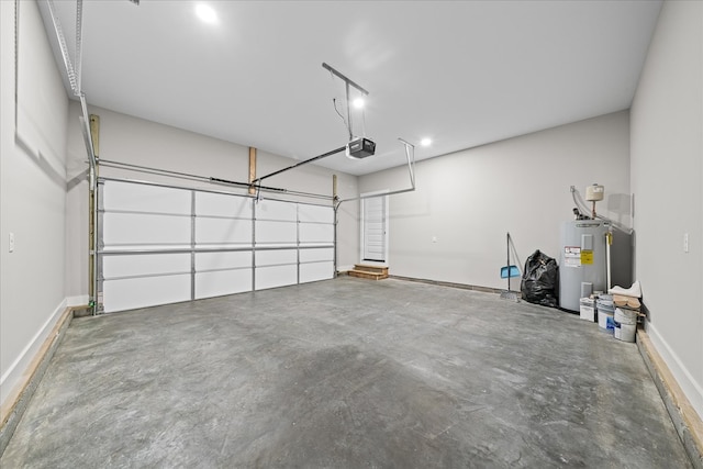 garage featuring water heater, baseboards, and a garage door opener