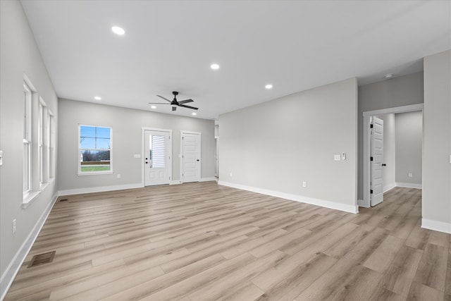 unfurnished living room featuring recessed lighting, visible vents, ceiling fan, and light wood-style flooring