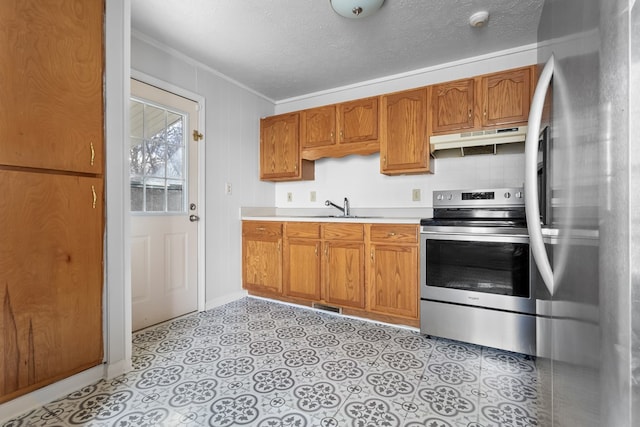 kitchen featuring visible vents, appliances with stainless steel finishes, ornamental molding, light countertops, and under cabinet range hood