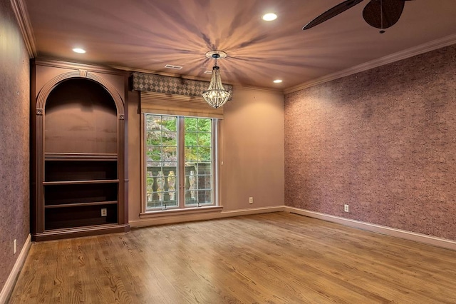 interior space with recessed lighting, wood finished floors, and crown molding