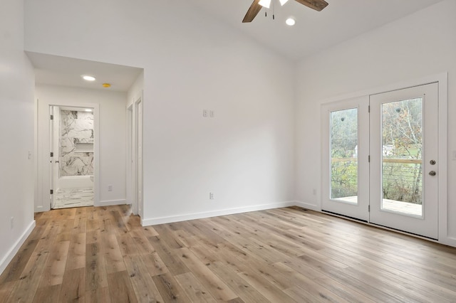 unfurnished room featuring light wood-type flooring, baseboards, a ceiling fan, and recessed lighting