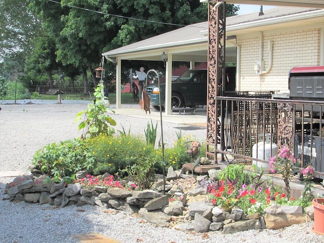 exterior space with brick siding