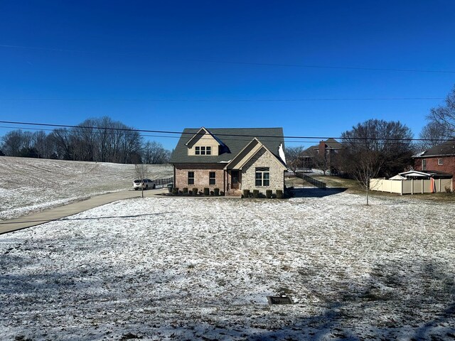 view of front of property featuring stone siding