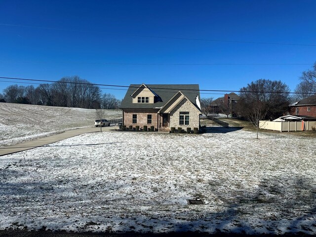 view of front of home with fence