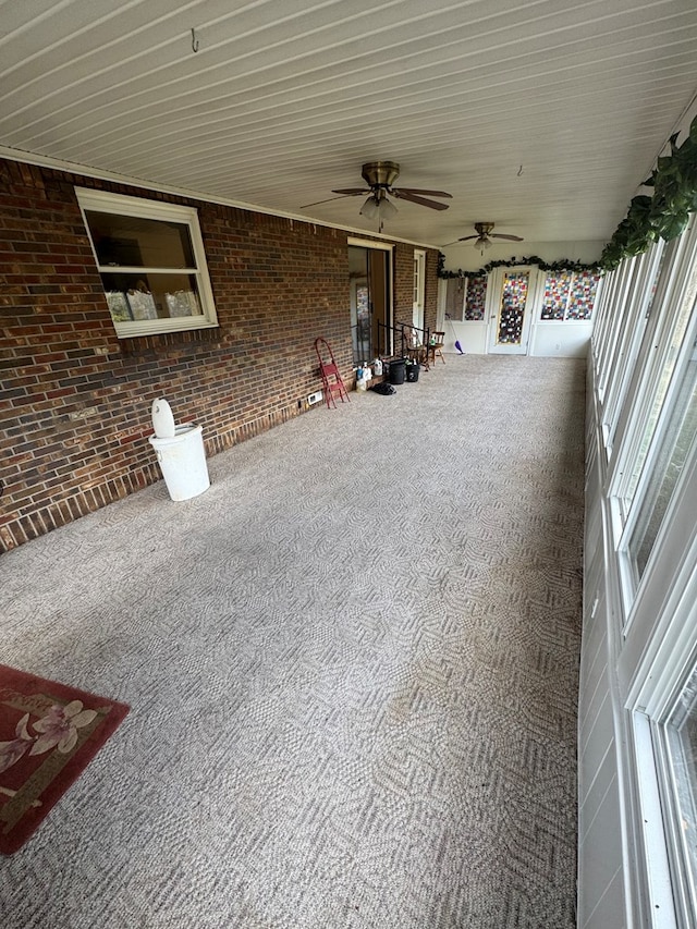 view of patio / terrace featuring a balcony and a ceiling fan