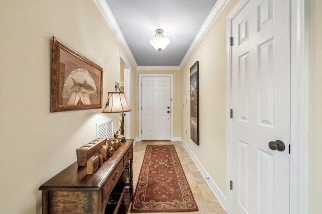 doorway with baseboards and crown molding