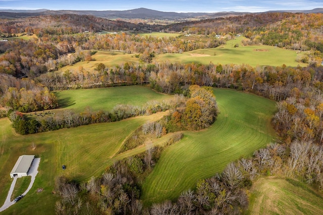 drone / aerial view featuring a mountain view and golf course view