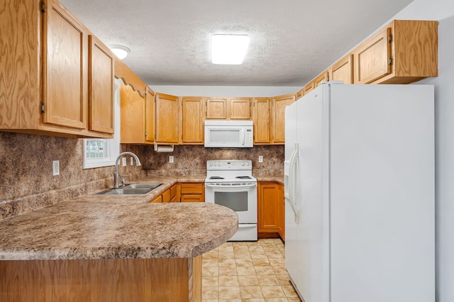 kitchen with light countertops, decorative backsplash, a sink, white appliances, and a peninsula