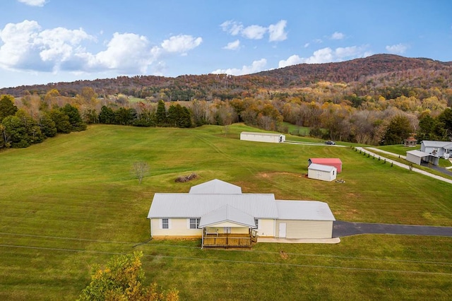 drone / aerial view featuring a mountain view