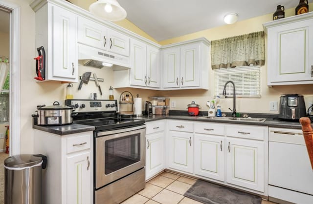 kitchen featuring dark countertops, white dishwasher, stainless steel electric stove, under cabinet range hood, and a sink