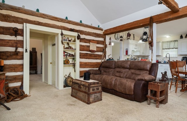 living room featuring high vaulted ceiling and light colored carpet