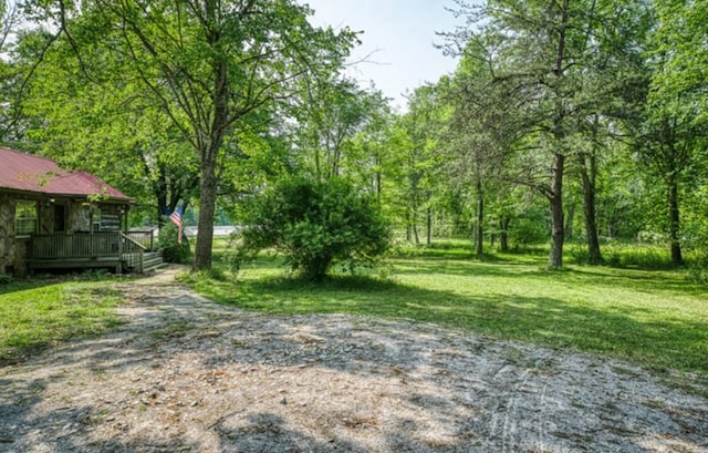 view of yard featuring a deck