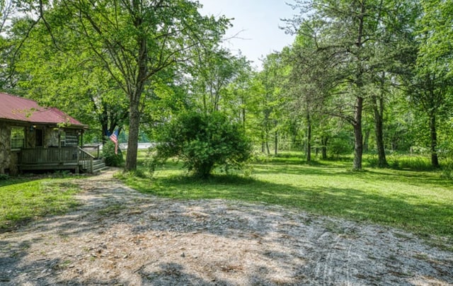 view of yard with a deck