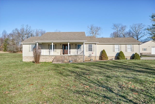 ranch-style house with covered porch and a front yard