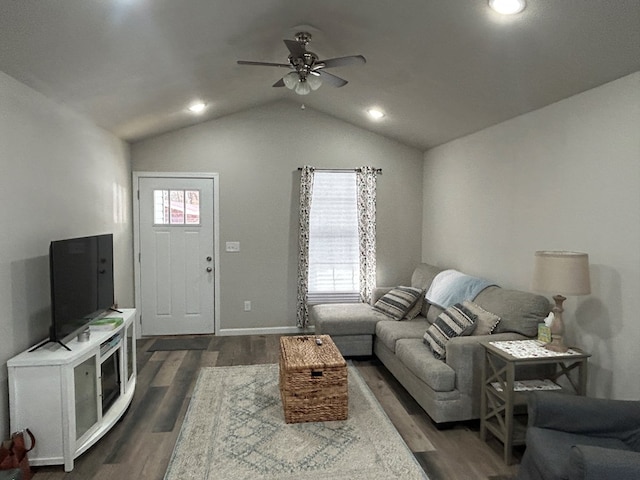 living area with dark wood-type flooring, lofted ceiling, ceiling fan, and recessed lighting