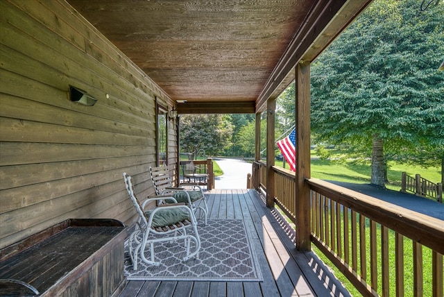 wooden terrace with covered porch