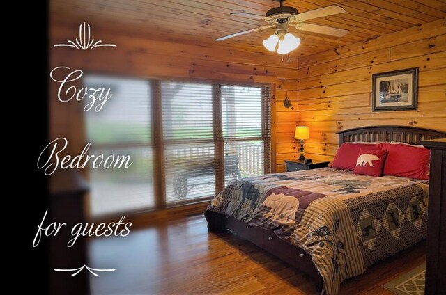 bedroom with wood walls, wooden ceiling, a ceiling fan, and wood finished floors