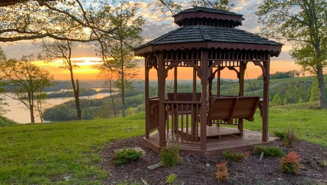 view of community featuring a gazebo and a lawn