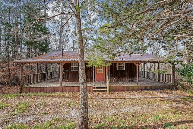 back of property with metal roof