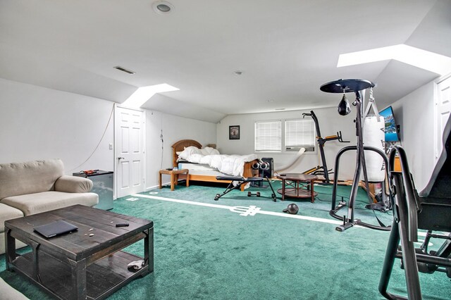 bedroom with lofted ceiling, carpet flooring, and visible vents