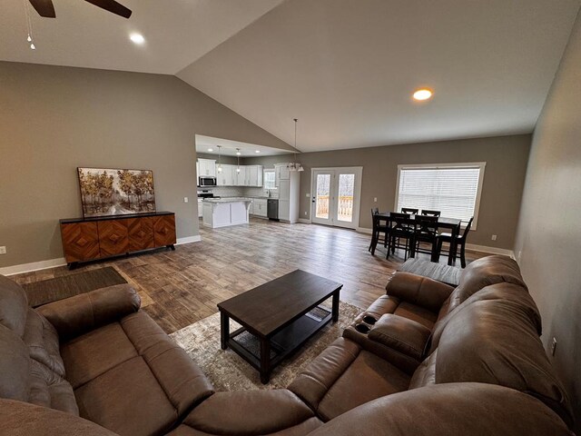 living area with french doors, recessed lighting, a ceiling fan, wood finished floors, and baseboards