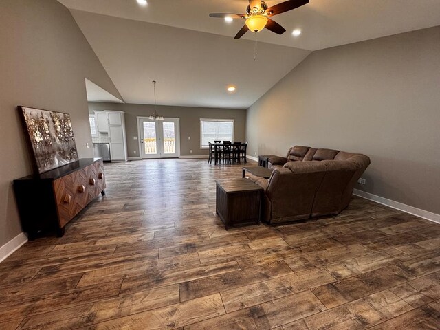 living room with recessed lighting, dark wood finished floors, a ceiling fan, and baseboards