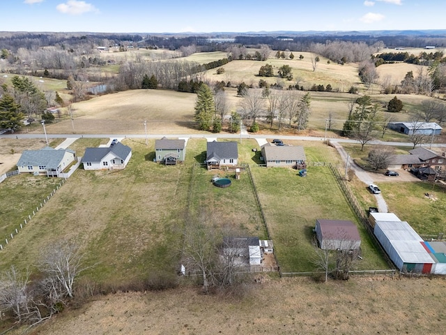 birds eye view of property featuring a rural view