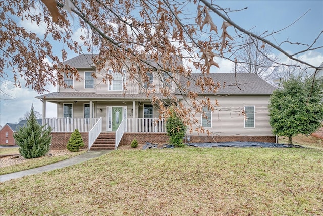 view of front of house featuring covered porch and a front lawn