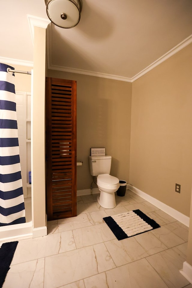 full bathroom featuring marble finish floor, toilet, ornamental molding, a shower stall, and baseboards