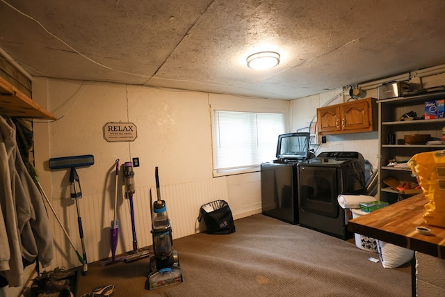 interior space featuring washer and clothes dryer and carpet flooring