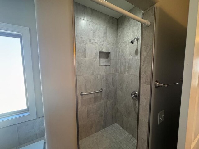 bathroom featuring a stall shower