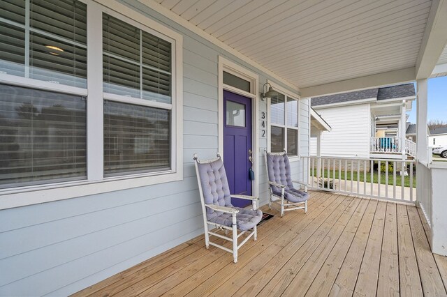 deck featuring covered porch