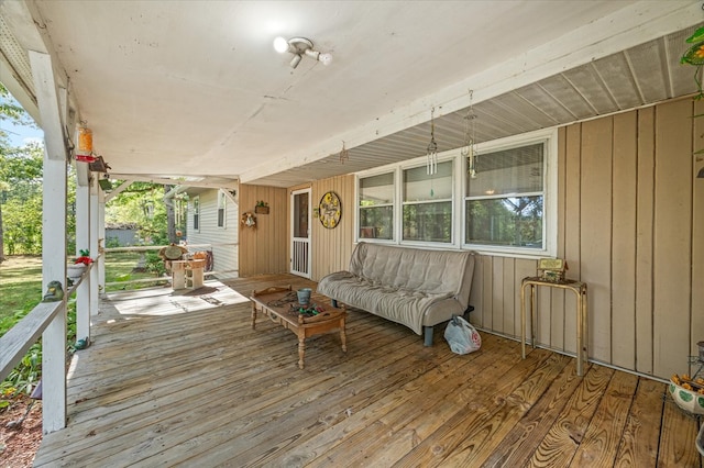 wooden deck featuring covered porch