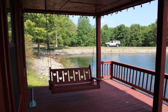 dock area with a water view