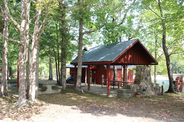 view of property's community with a patio and a gazebo