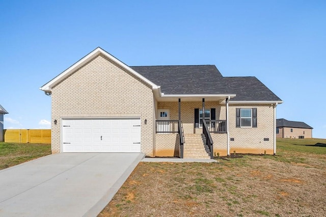 single story home featuring a porch, an attached garage, concrete driveway, a front lawn, and brick siding