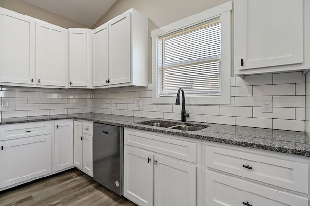 kitchen featuring dark wood-style floors, dishwasher, white cabinetry, and a sink