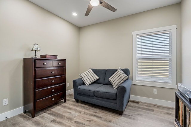 living area with visible vents, ceiling fan, baseboards, recessed lighting, and light wood-style floors