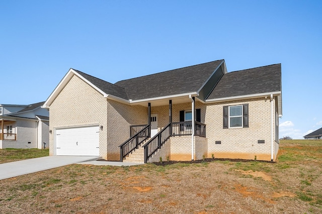 ranch-style home featuring a front lawn, a porch, concrete driveway, a garage, and brick siding