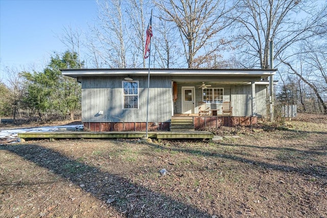 view of front of property with covered porch and a ceiling fan