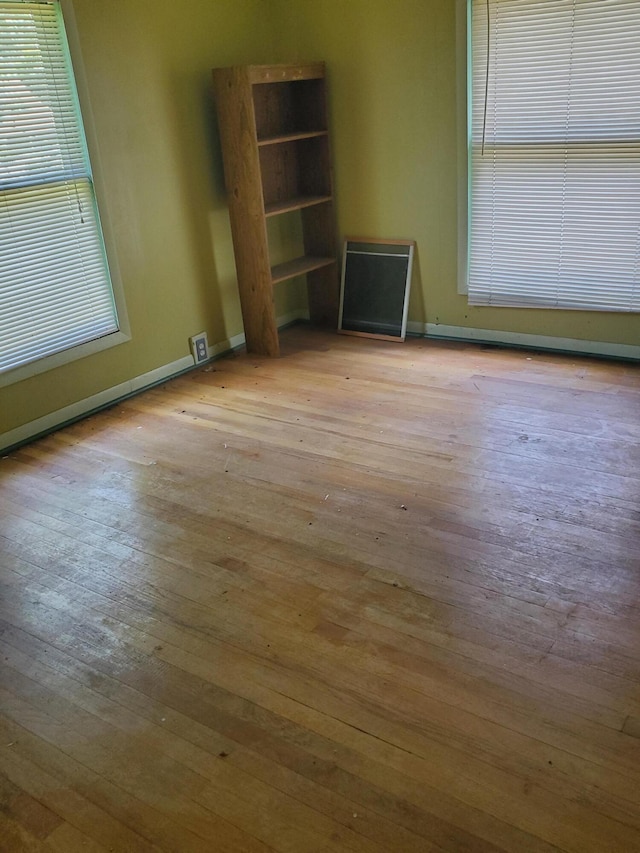 unfurnished room featuring light wood-type flooring