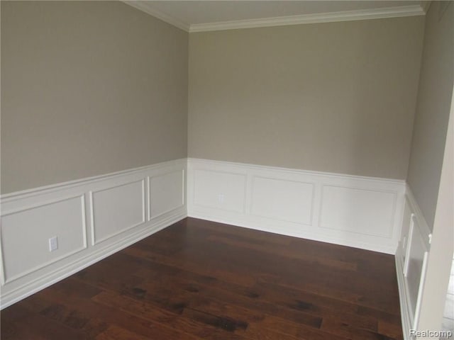 unfurnished room featuring crown molding and dark hardwood / wood-style flooring