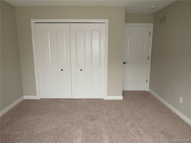 72859 Sorrel Dr, Bruce, MI 48065 - unfurnished bedroom with a closet, carpet floors, and baseboards