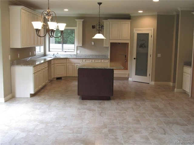 72859 Sorrel Dr, Bruce, MI 48065 - kitchen featuring a sink, a chandelier, ornamental molding, a center island, and recessed lighting