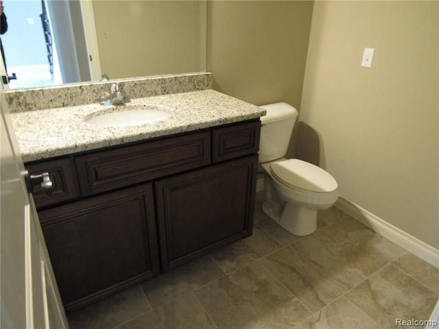 72859 Sorrel Dr, Bruce, MI 48065 - half bath with vanity, toilet, baseboards, and tile patterned floors